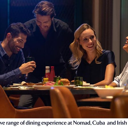 ジュメイラ クリークサイド ホテル ドバイ エクステリア 写真 Dining at Nomad