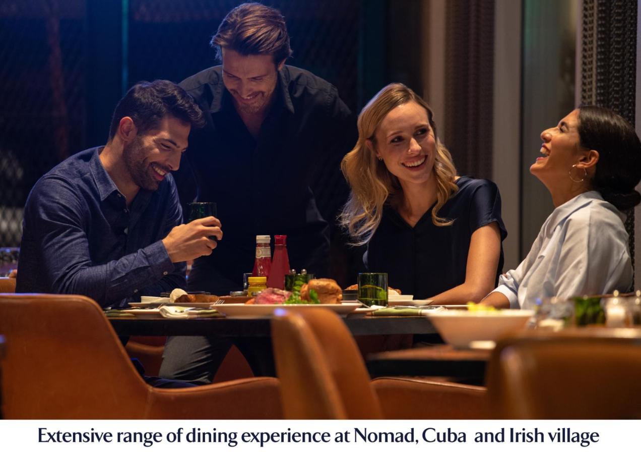 ジュメイラ クリークサイド ホテル ドバイ エクステリア 写真 Dining at Nomad